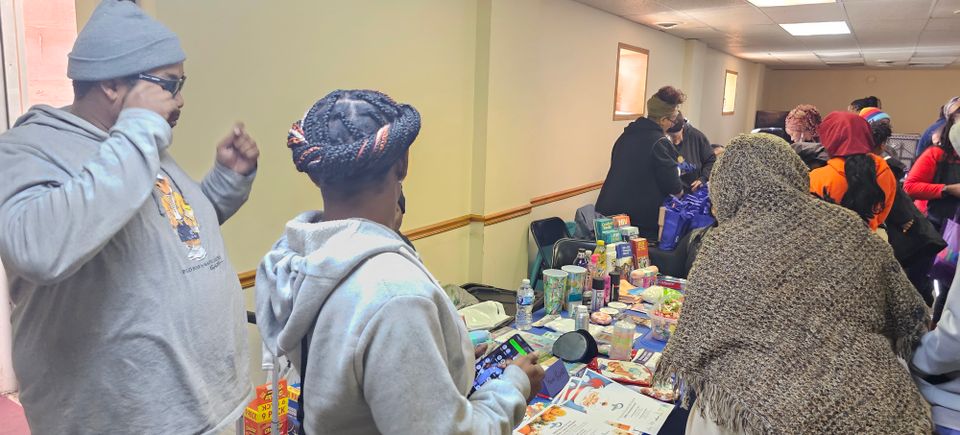 Community members receiving resources