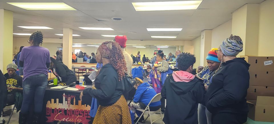 Event attendees connecting at a resource table